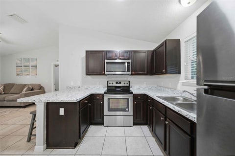 Tiny photo for 5931 NW 62nd Place, Ocala, FL 34482 (MLS # OM734927)