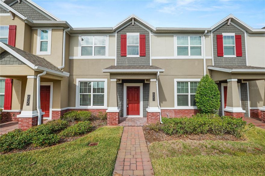 Welcome to this beautifully maintained 3-bedroom, 2.5-bath townhome in the Heritage at Plant Street community, where thoughtful design meets everyday convenience. From the moment you step inside, the layout feels intuitive and welcoming, ideal for both daily living and entertaining.

The main level features a spacious kitchen with granite countertops, generous upper cabinetry, and a gas range, creating a functional and inviting space to cook and gather. A convenient half bath for guests and a well-placed drop zone just off the two-car garage make daily routines effortless. The living area flows seamlessly to a private, pavered patio with a screened enclosure and gas grill hookup, perfect for relaxed evenings or weekend get-togethers.

Upstairs, new carpet adds a fresh feel throughout the well-sized bedrooms. The primary suite includes double sinks in the en-suite bath, while additional storage is thoughtfully located beneath the staircase. Double-pane windows enhance comfort and efficiency, and both the home and community are equipped with fire safety systems for added peace of mind. A gas water heater completes the home’s efficient design.

Residents enjoy a low-maintenance lifestyle with HOA amenities that include a community pool, dog park, sidewalks, and a community mailbox. Golf carts are permitted, adding to the neighborhood’s relaxed and connected feel. The HOA also provides exterior maintenance, grounds maintenance, and maintenance repairs in the community.
Located just steps from the Orange Park Trail, this home offers an easy walk or bike ride into downtown Winter Garden, where shopping, dining, and local favorites await. This move-in-ready townhome delivers comfort, functionality, and an exceptional location for those seeking convenient, low-maintenance living.