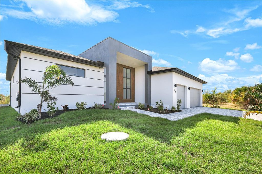 Photo of 14431 Artesia Avenue, Port Charlotte, FL 33981 (MLS # C7515866)