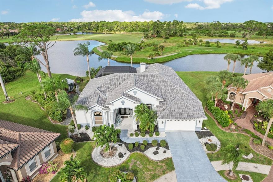 Experience refined living at its best in this exceptional residence located within the highly sought-after Heron Creek Golf & Country Club. Perfectly situated on a private cul-de-sac, this luxurious home offers a one-of-a-kind, unobstructed, captivating water and golf course view from nearly every room. The oversized, .31 acre homesite is enhanced by lush landscaping, a screened gazebo with electric, a fully equipped outdoor kitchen, and a custom-designed heated pool and spa with a swim-up table, expansive brick paver pool patio, and panoramic-view cage—the ultimate outdoor oasis built for luxury and entertaining!

Step inside to discover 3 spacious bedrooms, 3 full baths, and a large bonus room, ideal for an office, hobby room, or guest retreat. The open-concept floor plan showcases soaring 14 ft tray and coffered ceilings and architectural windows that fill the home with natural light. The gourmet chef's kitchen features a gas cooktop, double wall oven, solid wood cabinetry, wine cooler and expansive counterspace—perfect for entertaining. Additional highlights include a gas fireplace, Generac generator, and many more customizations!

Residents of Heron Creek enjoy a premier gated community with a guarded entrance, a 21,000 sq. ft. clubhouse, restaurant with formal and casual dining options, and an array of resort-style amenities. Enjoy 27 holes of Championship (Arthur Hills–designed) golf, tennis courts, fitness center and resort pool & spa.  The robust social calendar and three membership levels (starting at just $278/month) offer something for everyone. With no CDD fees, reasonable HOA fees, and services including lawn care, trimming, mulching, irrigation, FIBER OPTIC TV, and high-speed Internet, this community delivers exceptional value and lifestyle.