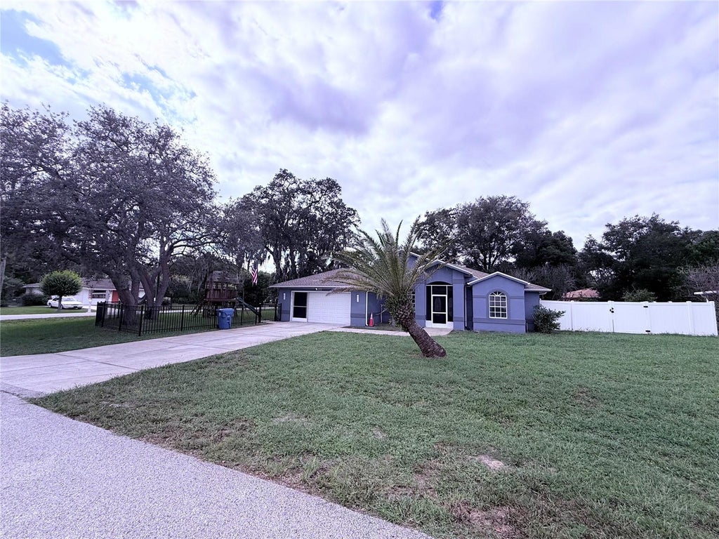 Photo of 173 Portland Avenue, Spring Hill, FL 34606 (MLS # TB8551433)