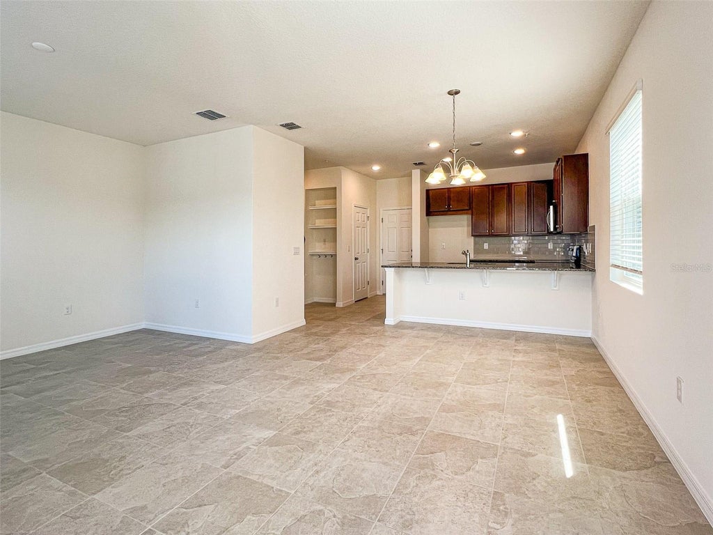Photo of 10227 Highline Crest Street, Orlando, FL 32832 (MLS # O6423053)