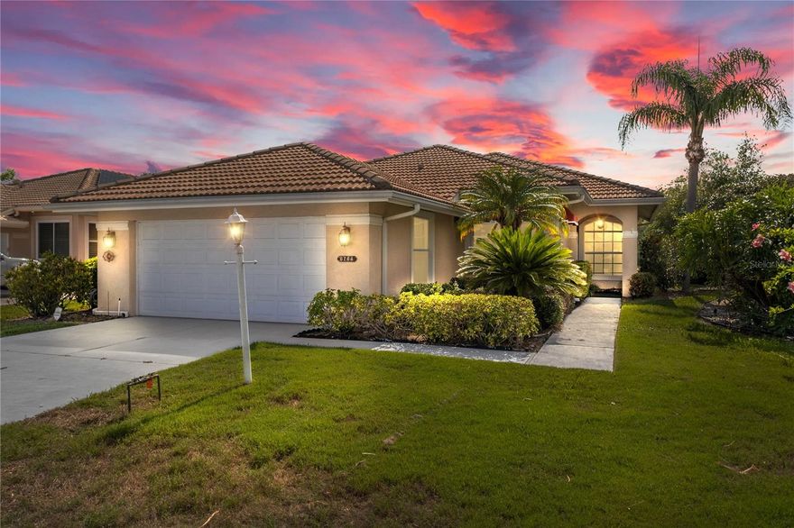 Perfectly located in the heart of River Club, this beautifully maintained home offers comfort, functionality, and peaceful pond views. As you step through the front door, you’re greeted by a welcoming foyer that flows seamlessly into the spacious living room with soaring ceilings and expansive sliding glass doors that frame the tranquil water view. Just off the entry, you’ll find a bright and flexible den—ideal for a home office, creative space, or cozy reading area. To the left, tucked away for privacy, you'll find the generously sized second bedroom and full bathroom. The living room flows effortlessly into the dining area and kitchen, creating an ideal space for entertaining or everyday living. The kitchen is bright and functional, with an island for additional storage plus a cozy breakfast nook, all while overlooking the pond and filling the home with warm, natural light. The primary suite is a peaceful retreat with beautiful views of the water, abundant natural light, and enough space to truly unwind. The en-suite bathroom features double vanities, a garden tub, large shower, and a spacious walk-in closet, creating a comfortable and relaxing environment. Step outside to the screened-in lanai—perfect for grilling, lounging, or enjoying quiet mornings as you watch the sunrise. Located near The River Club Golf Course and just minutes from Lakewood Ranch Main Street, this home blends location, lifestyle, and low-maintenance living—with no CDD fees.