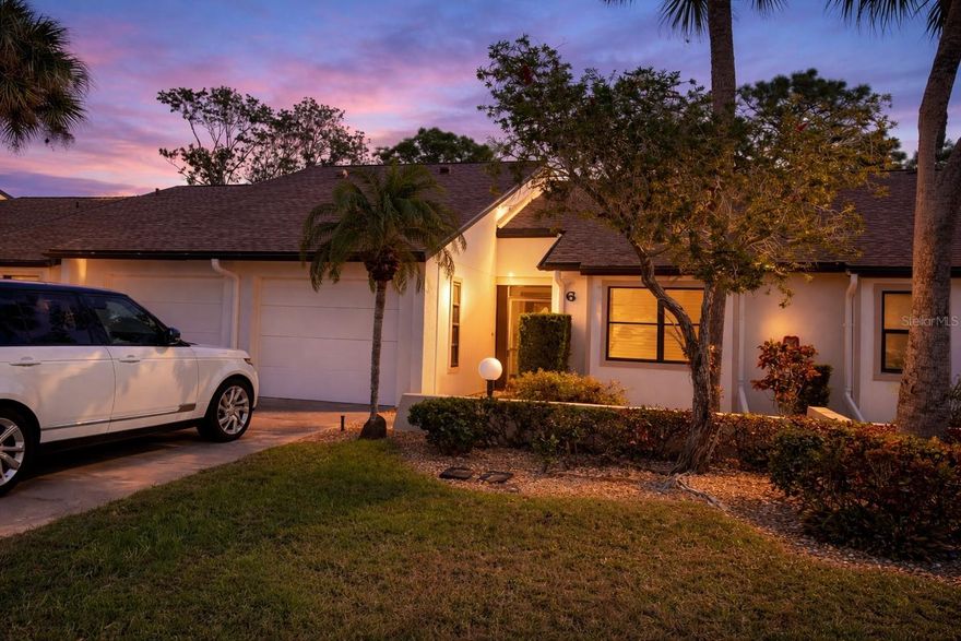 Welcome to refined, low-maintenance living in the heart of Venice’s desirable Capri Isles area. Unit #5 at 1211 Capri Isles Blvd is a beautifully maintained villa offering a serene setting, thoughtful layout, and effortless Florida lifestyle just minutes from beaches, golf, and downtown Venice.

This single-story residence is light-filled and inviting, with an open living and dining space designed for both everyday comfort and relaxed entertaining. Neutral finishes and abundant natural light create a calm, coastal-inspired atmosphere that feels instantly welcoming.

The kitchen is well-appointed with generous cabinetry and workspace, ideal for casual meals or hosting guests. The primary suite serves as a peaceful retreat, featuring ample closet space and a private bath, while the guest bedroom provides flexibility for visitors, a home office, or seasonal living.

Enjoy the ease of a maintenance-free community, allowing you to focus on the lifestyle you’ve earned — whether that means mornings at the beach, afternoons on the golf course, or evenings in charming downtown Venice.

Ideally located near Capri Isles Golf Club, Legacy Trail, shopping, dining, and medical facilities, this villa is perfectly suited for full-time residents, seasonal owners, or those seeking an elegant downsizing opportunity.

Timeless, convenient, and quietly upscale — this is Florida villa living at its finest. Some photos are AI generated with furniture.