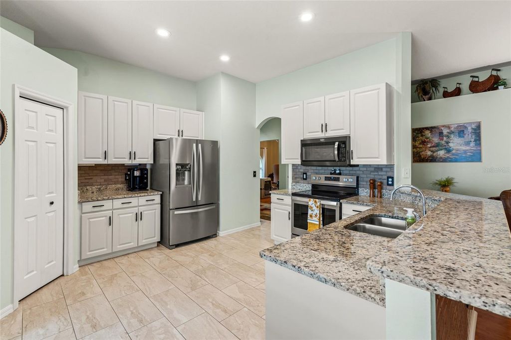 Photo of 34717 Pinehurst Greene Way, Zephyrhills, FL 33541 (MLS # T3485394)