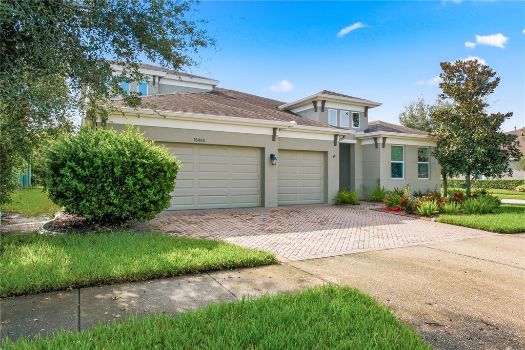 Photo of 16485 Courtyard Loop, Land O Lakes, FL 34638 (MLS # TB8524905)