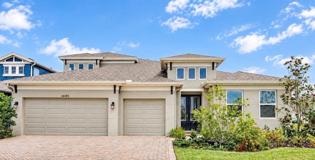 Photo of 16485 Courtyard Loop, Land O Lakes, FL 34638 (MLS # TB8524905)