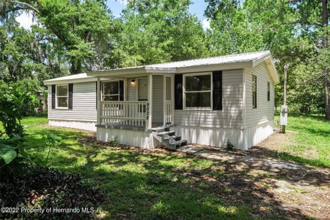 Photo of 9038 Parrish Avenue, Brooksville, FL 34601 (MLS # W7890507)