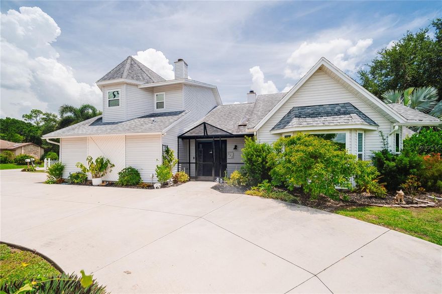 One-of-a-Kind Victorian Home in Desirable Country Club Estates! No Flood Insurance Required! This beautifully unique 3-bedroom + den, 2-bathroom home offers an impressive 2,721 sq ft of thoughtfully designed living space. The screened-in entryway offers a welcoming first impression while providing added privacy, security, and the perfect spot to enjoy Florida’s breezes—free of pests. From the moment you enter, you'll be captivated by the grand two-story foyer and elegant staircase—setting the tone for the character and charm found throughout the home. Elegant marble tile flooring extends through the main living areas, while the bedrooms feature durable and stylish luxury vinyl plank flooring. Upstairs, the spacious primary suite includes a cozy sitting area with a wood-burning fireplace, creating a warm and inviting retreat. The updated primary bathroom offers ample space for both comfort and functionality. Two additional downstairs bedrooms provide generous storage, with the second bedroom featuring direct access to the second full bath—ideal for use as a second primary suite. The second bathroom has been beautifully updated, featuring elegant mosaic tile and a classic freestanding slipper tub—adding charm and character to the space. A dedicated theater room at the rear of the home comes equipped with surround sound speakers, perfect for movie nights or entertaining. The additional den/study is currently used as a guest bedroom and can easily be converted into a fourth bedroom with the addition of a closet. The kitchen showcases white shaker cabinets, granite countertops, a large granite sink, stainless steel appliances and flows seamlessly into the living area, where a rare wood-burning fireplace adds an extra touch of coziness—an uncommon gem in Florida homes. The home features recently updated mirrors, lighting fixtures and ceiling fans, each thoughtfully selected to complement the style and function of every room. Soaring ceilings enhance the sense of space and openness, while multiple skylights fill the interior with an abundance of natural light, creating a bright and inviting atmosphere throughout. Step out to the screened lanai, which also features closable windows, allowing it to double as a Florida room for year-round enjoyment. A storage shed provides extra space, while the fully fenced yard and circular driveway enhance privacy and curb appeal. Oversized one car garage measures 16 feet wide and 20 feet deep. This home is equipped with three separate A/C units (2020), offering energy-efficient climate control by cooling only the areas in use. The roof was replaced in 2018, Impact Windows in 2021, and the water heater in 2024. Located on CITY WATER, the property features mature banana, sugar apple, and passion fruit trees, offering a lush, tropical setting and the opportunity to enjoy fresh fruit right from your own backyard. Home warranty in place and will be transferred to the new owner, along with all furnishings being negotiable.