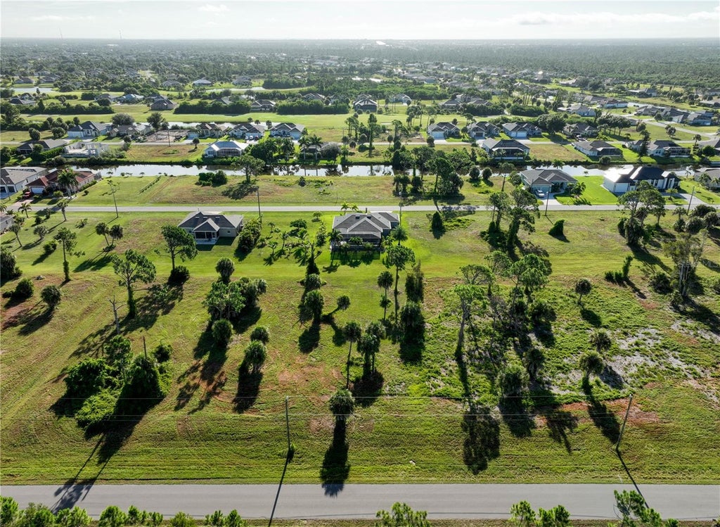 Photo of 275 Rotonda Boulevard S, Rotonda West, FL 33947 (MLS # D6148611)