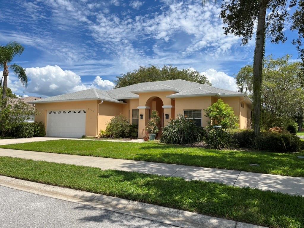 Step into a sanctuary of light and calm near the heart of Safety Harbor. This inviting 3-bedroom, 2-bathroom pool home has been lovingly cared for by one family since it was built. Its private, separate bedroom retreats and spacious layout—with high ceilings and recessed lighting—create a sense of openness and tranquility beyond its size. Outside, discover a quiet hammock spot beneath graceful crepe myrtle trees beside a peaceful pond and fountain—a perfect place to pause, breathe deeply, and embrace stillness. Soft sunlight streams through expansive windows throughout the day, inviting you to savor moments of peace and presence. A short walk leads to the natural beauty of Philippe Park, while the charming shops, groceries, and restaurants of Safety Harbor are close at hand, blending convenience with small-town serenity. A generous green space, free from traffic, borders the property—offering a safe play area and long, calming views. Recent updates—including a new water heater, water softener, garage door opener, and pool re-screen—provide comfort and peace of mind. Here, light, views, and quiet come together, creating a home that gently invites you to live fully, simply, and well.
