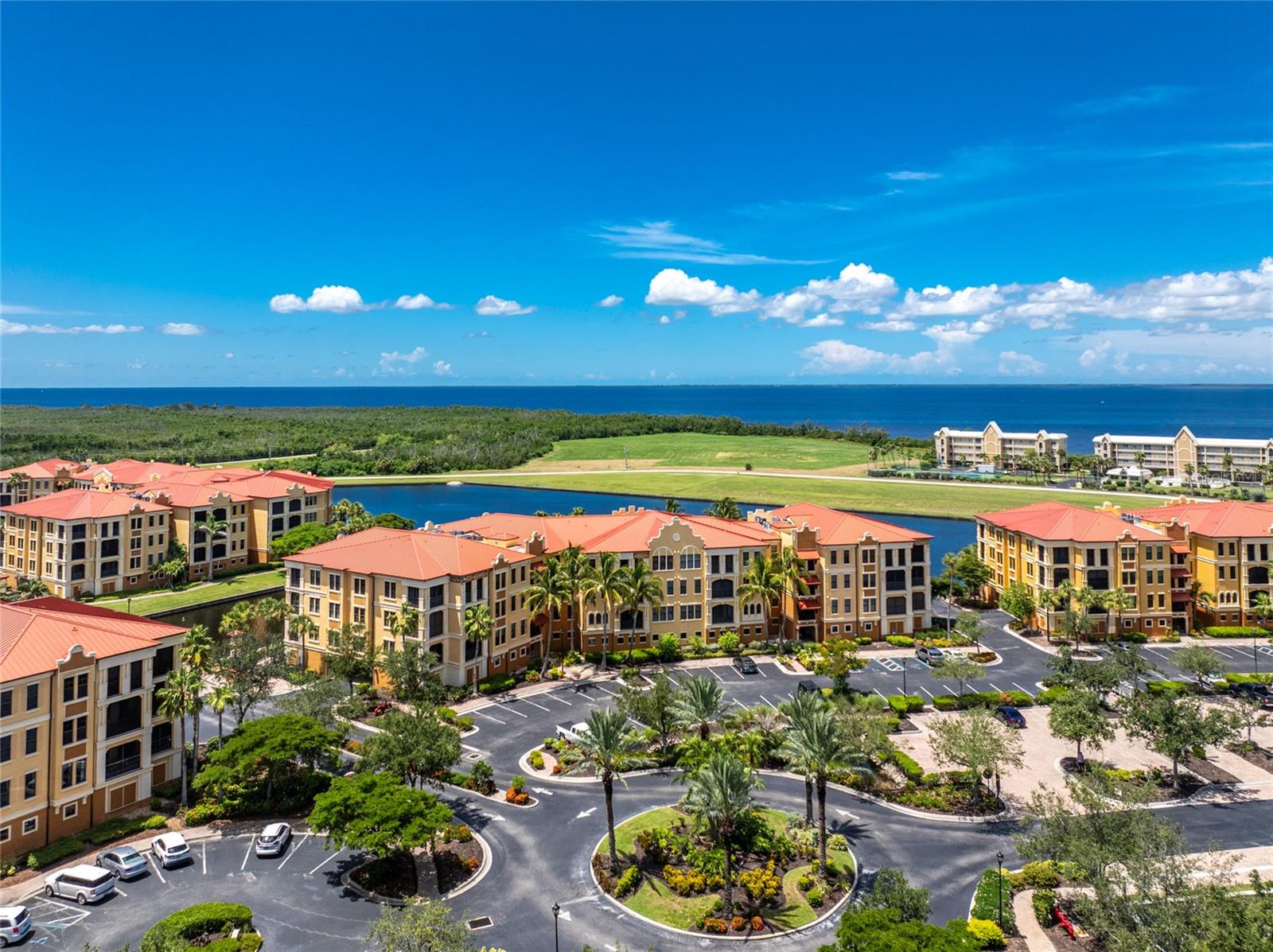 One or more photo(s) has been virtually staged. Welcome to Vivante, Punta Gorda's premier address for Resort Style living. Residents enjoy top-notch amenities and lushly landscaped grounds in this Mediterranean style complex featuring a gorgeous Resort Style Pool and Spa, Lap Pool, Tennis Courts, Club Room, Billiard/Game Room, Library/Reading Room, state of the art Fitness Center with aerobics room, Men's and Women's Locker Rooms with Steam and Sauna and even onsite spa services! This 4th Floor 2 Bedroom, 2 Bathroom, split floor plan unit is just what you're looking for. High 10- foot ceilings, 8- foot doors, 6- inch baseboards and 3 ½ inch casings provide an open and airy living space. Glass doors in the Living Room and Dining area both open to a lovely tiled and screened lanai which is a great place to end your day. The bright Kitchen features 42 inch cabinets, solid surface counter tops with breakfast bar, GE appliances, a deep stainless- steel double bowl sink and built in desk. The dinette area is located off the kitchen and features high windows and a door to the lanai. The roomy Primary Bedroom features an En-Suite bathroom, 3 windows, glass door to the lanai and 2 ample closets. The Primary bathroom features a glass enclosed walk-in shower, a luxurious soaking tub, dual vanities and private water closet. The guest Bedroom features a walk-in closet and separate door to the guest bathroom for your guest's privacy. The Guest Bathroom pocketing has entrance doors from both the Main living area and the Guest Bedroom and features a glass enclosed walk-in shower. The Laundry Room is located just off the kitchen. For peace of mind, you'll find complete hurricane protection that includes impact glass windows. The unit's spacious 12 foot by 24 foot private garage is located under the building. Located at the mouth of the Peace River, it's just a short drive to Downtown Punta Gorda, one of Florida's best small towns, with plenty of restaurants and town activities to enjoy. Just a short drive to the new Sunseeker Resort, it doesn't get any better than this to live your dream Florida Lifestyle.