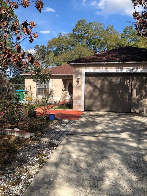 Photo of 1840 Howland Boulevard, Deltona, FL 32738 (MLS # V4947804)