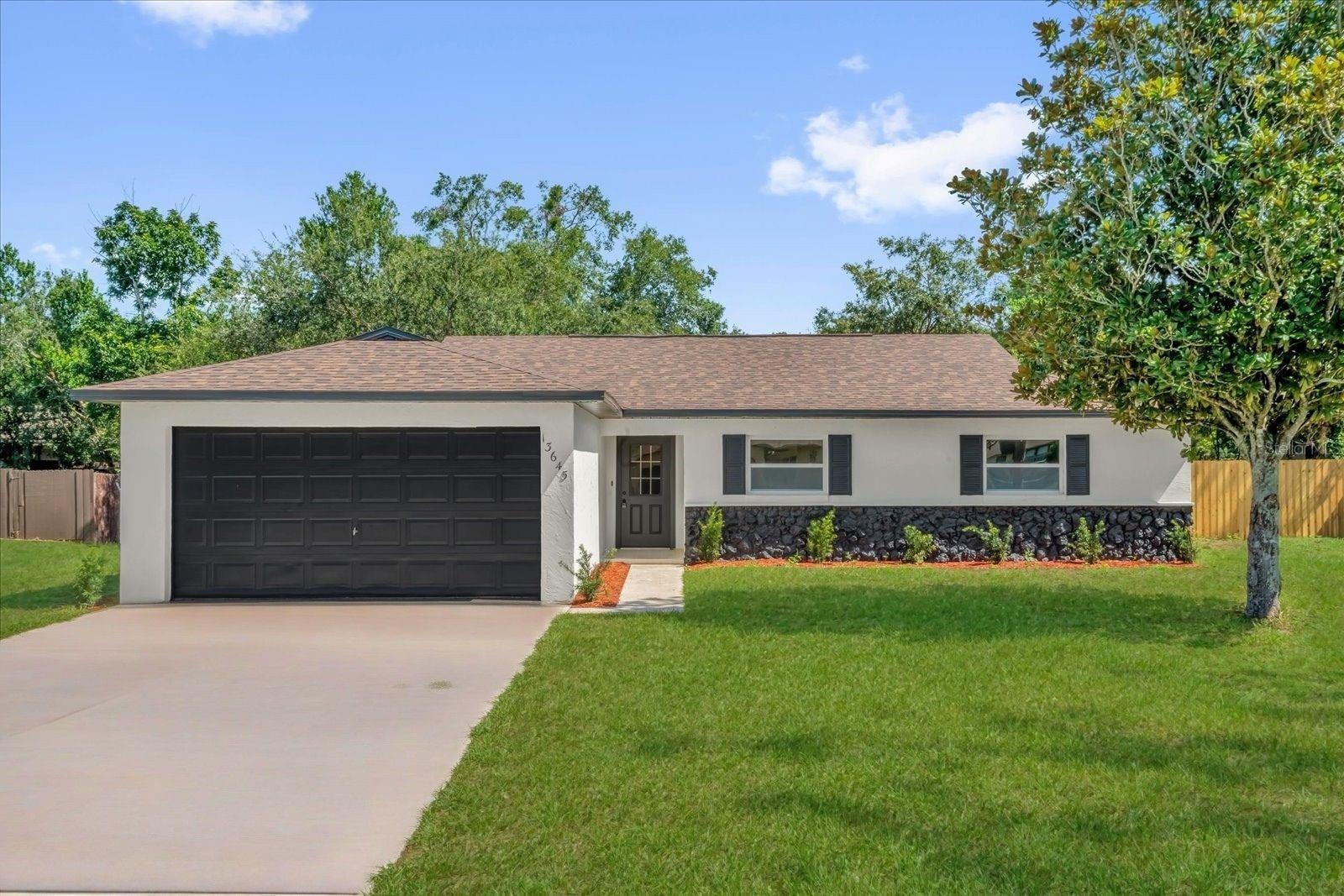LISTED 15K UNDER APPRAISED VALUE! Seller offering $10,000 towards buyers CLOSING COSTS and RATE-BUY DOWN!! Take advantage of this FULLY RENOVATED & RARE deal with built in equity on day one! Welcome home to your new fully renovated home from top to bottom. This charming residence offers a spacious and functional layout with 4 bedrooms, 2 bathrooms, an additional office/den space and a bright, open-concept living area. Every inch of this home has been updated thoughtfully including the major items like a brand new roof (2025), brand new HVAC (2025), new water heater (2025), brand new windows (2025), all new appliances, completely new kitchen and all brand new bathrooms! The kitchen and bathrooms have been completely remodeled with modern finishes, complemented by NEW vinyl plank flooring throughout, FRESH interior and exterior paint, NEW baseboards, doors, lighting fixtures, ceiling fans, and SO MUCH MORE! Outside, enjoy a private pool with brand-new pool equipment and a resurfaced patio with a new screened enclosure as well as your oversized yard. Move in with ease with absolutely nothing to worry about. Situated on a quiet street with convenient access to schools, shopping, and dining. Also located right in between Lake Eustis and Lake Yale - perfect for boating, kayaking, swimming and enjoying the lake life. This home offers a rare opportunity to own a beautifully updated property with immediate value. Schedule your showing today!