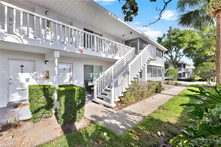 One or more photo(s) has been virtually staged. Where Maitland's pristine waters meet a modern lifestyle!

This luxury condominium in the coveted Lake Maitland Terrace community offers a rare blend of elegance and convenience on the shores of Lake Maitland within the famed Winter Park Chain of Lakes. Nestled among lush green spaces, this impeccably maintained mid-century modern complex boasts easy access to boutique shops, upscale dining, and vibrant entertainment. This unit stands out with its unique two-bedroom, one-and-a-half-bath layout—a rare find in the community, where most units are built with just one bath. Sunlight floods in through large windows, and warm wood floors flow throughout. This charming efficiently designed kitchen, with light cabinetry with contrasting hardware, quartz counters, and stainless steel appliances, is perfect for entertaining. Beyond the comforts of the home, enjoy the exclusive opportunity to secure a boat slip—a prized amenity in this tranquil lakeside retreat. Complex is amenity-rich with sidewalks, community pool, generous dock, shuffleboards and more. Walk to Lake Lily Park’s events, the Enzian Theater, and be just minutes from Winter Park Village and Park Avenue. Zoned for top-rated schools—Dommerich Elementary, Maitland Middle, and Winter Park High—this is a chance to embrace the best of Maitland living. Don’t miss your chance to claim this exceptional retreat as your own.