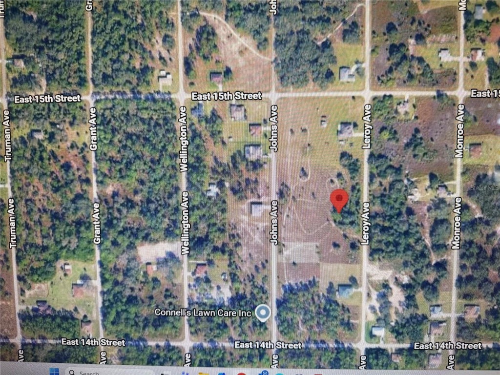 Photo of 1413 Leroy Avenue, Lehigh Acres, FL 33972 (MLS # OM733343)