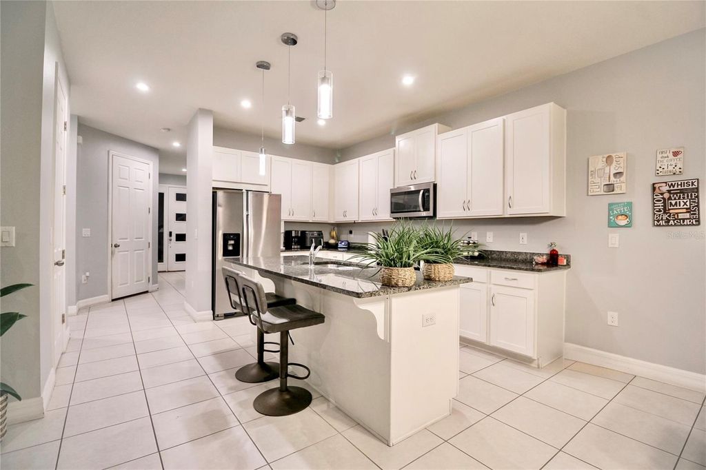 Photo of 2280 Avian Loop, Kissimmee, FL 34741 (MLS # O6389256)