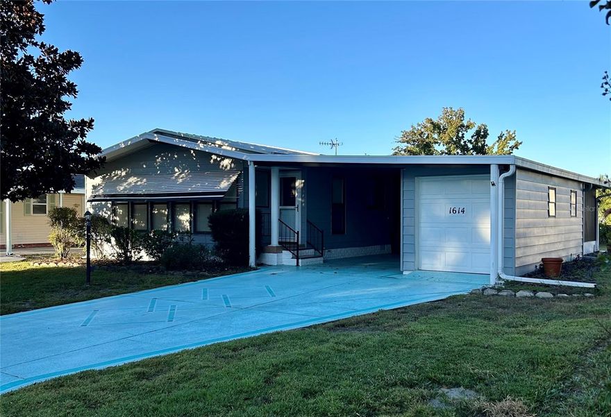 New listing - No Bond and No CDD.  This spacious St. Lucia Model is located on a quiet street located in the beautiful historic area of The Villages, in Country Club Hills.  This 2B/2B home has an updated kitchen and a INSIDE laundry area.  The floors have a Lifetime Residential Warranty Waterproof Rigid Luxury Vnyl Plank flooring thru-out, including the closets.  The large living room has a wall of windows to brighten the room and even a coat closet.  The master bedroom is large with a walk-in closet.  The master bath has a shower stall, an additional closet and a linen closet.  There is a large lanai/Florida room enclosed with air and heat.  The carport is covered.  The extended golf cart garage includes a workbench and storage area.  The A/C was installed 2021 and the home has a metal roof.  You are a golf cart ride away to Spanish Springs Square for your nightly entertainment, restaurants, shopping, doctors and the hospital.   There are many 9 AND 18 hole golf courses, pickleball courts, tennis courts, bocce ball courts, softball fields, bowling, pools and many recreation centers for inside activities including pool tables.  Additional photos will be added soon.  Be sure to call today to see this home.