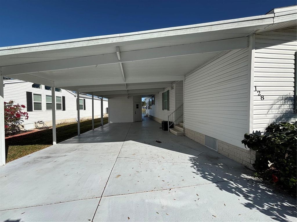 Photo of 128 Riverwalk Drive, North Port, FL 34287 (MLS # D6145665)