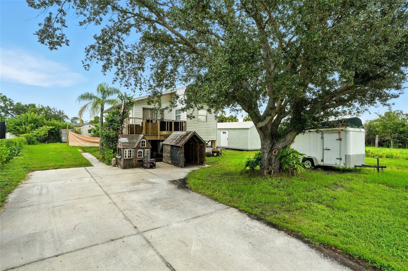 Don’t miss this 2-bedroom, 1-bath single-family home situated in the heart of Lehigh Acres. Sitting on a spacious quarter-acre lot, this property offers plenty of potential—whether you’re looking for your first home or a great investment opportunity. Recent updates include a newer A/C unit, new landscaping for privacy, and a freshly pumped septic system, giving you peace of mind from the start. Plus, this home is not located in a flood zone, keeping costs low and value high. With room to add your personal touches, this home is full of possibilities. Affordable properties like this don’t stay on the market long—schedule your showing today!