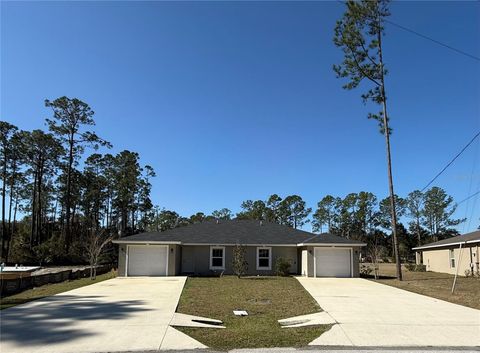 Photo of 49 Brunswick Lane #A, Palm Coast, FL 32137 (MLS # FC316393)