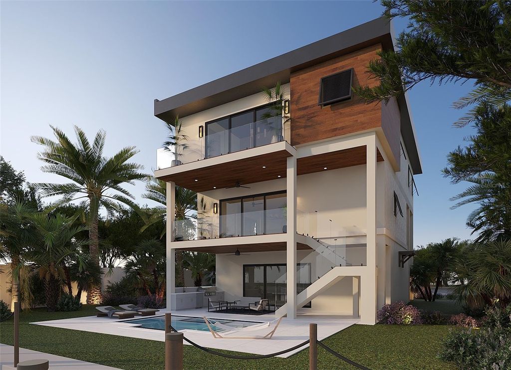 Photo of 14184 W Parsley Drive, Madeira Beach, FL 33708 (MLS # A4682107)