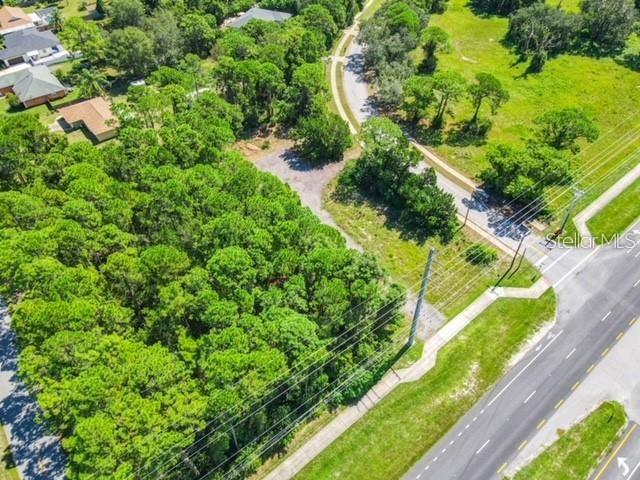 Don't miss this rare opportunity to own .69 acres of strategically located commercial land in Volusia county. Perfect for commercial visibility and exposure, this property offers main road frontage on S Ridgewood Ave, access to utilities, minutes away from New Smyrna Beach!
Excellent location. Corner lot on main road. Zoned B-4 General commercial classification and R-3 Urban single family residential. Land size approximate 100x300. Priced to sell. Offers welcomed!