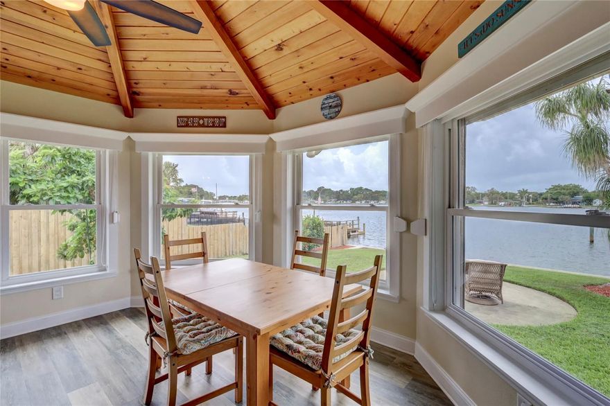 This Stunning Island home can be your family's new Holiday destination! It remained completely dry during Hurricane Idalia & has never flooded! This opulent 3-bedroom, 2-bathroom waterfront masterpiece is a symphony of sophistication and comfort, nestled in an idyllic location. From the moment you arrive, you'll be captivated by awe-inspiring views & meticulous attention to detail. Prepare to be inspired by the gourmet kitchen, a culinary enthusiast's paradise. Outfitted w/top-of-the-line appliances, including a wine fridge, stand-alone ice maker, & built-in bar area, the kitchen stands as the heart of the home w/a spacious island that has gorgeous Quartzite stone and will be the perfect place for social gatherings and culinary exploration. Experience the allure of open-concept design, seamlessly uniting the kitchen and living areas. The master bedroom boasts, a huge walk-in closet complete with his and her drawers offering abundant space for your curated collection. The stunning ensuite is a sanctuary of relaxation, showcasing a separate tub and shower that beckons you to unwind after a long day. This spacious home features a sizable laundry room complete with built-in cabinets, as well as an abundance of additional closets designed for effortless storage. Immerse yourself in the breathtaking waterfront panorama that graces nearly every room. Greet the day with the tranquil presence of water and retire to a peaceful evening under starlit skies, infusing every moment with serene tranquility. Entertain with grace as sliding doors lead to a covered lanai, a seamless transition from indoor to outdoor living. Equipped with hurricane-impact windows, and doors, along with a generator, and a newer tile roof this residence ensures worry-free living during inclement weather. Embrace the coastal lifestyle with a private covered boat slip and dock. Whether it's fishing, entertaining, or quiet reflection, this space invites you to create lasting memories. Watch dolphins and manatees glide by as you soak in the waterfront symphony. Elevate your living experience with an outdoor ambiance that welcomes relaxation and leisure. The spacious yard offers the perfect opportunity for a pool installation. The garage provides ultimate protection for your vehicles, which easily accommodates two cars, and is complete with convenient cabinets for effortless storage solutions. Whether you're indoors or outdoors, get accustomed to witnessing the most stunning sunsets. Host gatherings, engage in recreational pursuits, or simply revel in the warm embrace of the sun. As you embark on culinary journeys, relish in the company of loved ones against the backdrop of tranquil waters. Situated a mere 3 miles from downtown St. Petersburg, this remarkable property offers easy access to a vibrant array of top-tier restaurants, captivating music venues, and enriching arts and museums. Additionally, a brief ride leads to some of the region's most stunning beaches. The island locale boasts an array of recreational amenities, including tennis & basketball courts, soccer fields, 2 dog parks, a playground, a dock, and a scenic walking trail. Within a convenient stroll lies the acclaimed Southside Brew, a charming coffee shop, as well as Mullets Fish Camp for dining, drinks, & live music.  Immerse yourself in an oasis of elegance, where each day is a celebration of comfort, style, and breathtaking beauty schedule your private tour today!