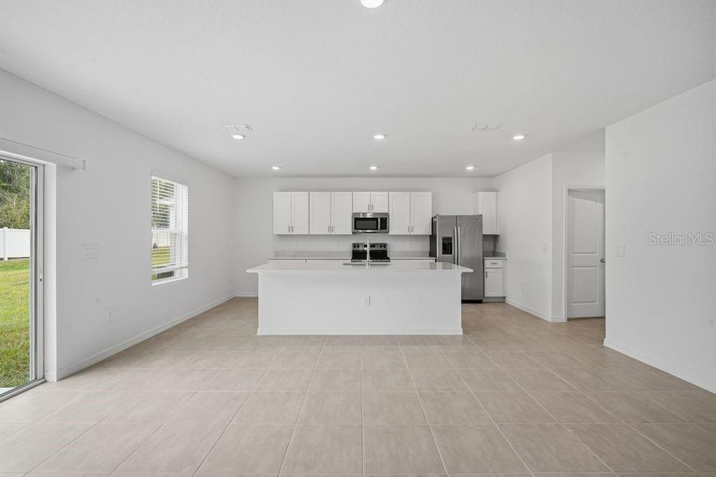 Photo of 13470 Tropical Breeze Way, Hudson, FL 34669 (MLS # TB8372298)