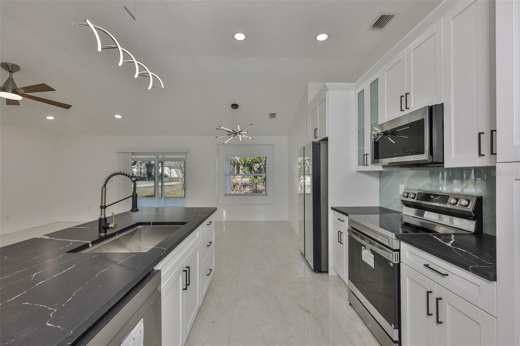 Photo of 4423 Horseshoe Pick Lane, Valrico, FL 33594 (MLS # TB8443130)