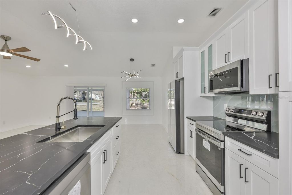 Photo of 4423 Horseshoe Pick Lane, Valrico, FL 33594 (MLS # TB8443130)