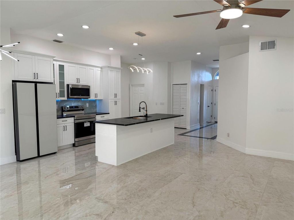 Photo of 4423 Horseshoe Pick Lane, Valrico, FL 33594 (MLS # TB8443130)