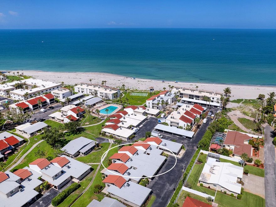 Welcome to The Village by the Sea, Aldea Mar, a charming condo community featuring one of the the largest coastal frontage in Venice, with over 500 feet of private deeded beach access. This is a rare opportunity to own a fully turnkey two bedroom, one and a half bathroom villa. The bright and spacious interior lives like a private residence, with vaulted ceilings and an exposed natural wood look ceiling that brings warmth and character to the space. Aldea Mar offers a relaxing coastal lifestyle, including a large heated swimming pool, a putting green, shuffleboard courts, and a welcoming clubhouse for residents and guests. Owner will transfer short-term rental lease from 01/01/2026 - 2/28/2026. Conveniently located just one mile from the vibrant Venice Historic District, Lake Venice Golf Club, and several scenic island parks, this villa combines comfort with an unbeatable location. Whether you are seeking a full time residence, a seasonal retreat, or an investment opportunity, this home is your chance to join one of the most desirable communities on the Gulf Coast.