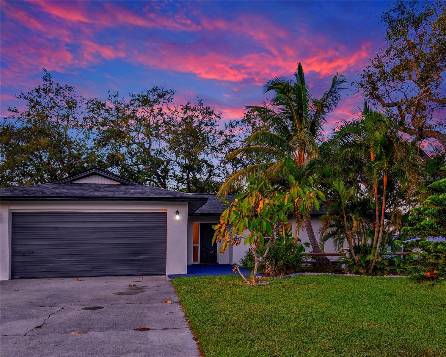 Welcome to your perfect beach getaway! This spacious fully furnished 4-bedroom, 2-bathroom home minutes away from Sunset Beach is just a short stroll from the serene Sunset Beach. All utilities are included in rent: internet, electricity, water, trash. Kitchen is fully supplied. With a large living room and open kitchen combo, you'll have plenty of space for entertaining and creating memories. The home also features a garage and a peaceful outdoor deck with a fenced yard perfect for lounging and enjoying the coastal breeze. House has been completely renovated less than a year ago. New flooring, kitchen, windows, appliances, fresh paint. Walking distance to Sunset beach, short bike ride to Fred Howard Park. This hidden gem offers a calm, laid-back vibe with fewer crowds than the larger beaches. It's the perfect spot to watch a breathtaking sunset, relax on soft sand, or enjoy a peaceful walk along the water. Close to Sponge Docks, shopping, 2 major airports. Call today to schedule a showing.