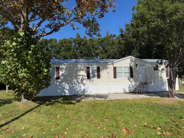 Turn-key double wide home on a spacious lot in Tampa! This beautifully updated property features a new metal roof, brand-new siding, fresh interior and exterior paint, and new flooring throughout. Enjoy a bright open layout, a large yard, and plenty of parking space. Perfect for buyers seeking a move-in-ready home in a convenient location close to shops, dining, and major highways.