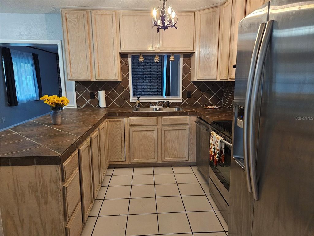 Photo of 1212 Blake Ave, Auburndale, FL 33823 (MLS # P4936709)