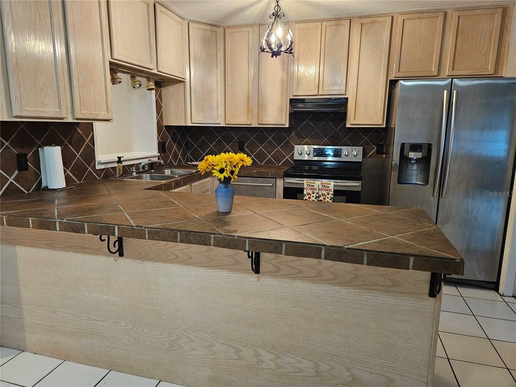 Photo of 1212 Blake Ave, Auburndale, FL 33823 (MLS # P4936709)