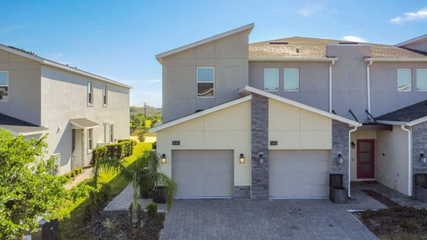 Fully furnished and move-in ready! Welcome to this beautifully, spacious and stylish 2 bedroom abode nestled in the heart of Champions Gate, a beautiful gated community and resort destination in central Florida. This home not only offers a charming retreat for family getaways but also presents an enticing opportunity for
savvy short-term rental investments. All the primary living spaces are thoughtfully situated on the main level of the residence, with the garage
thoughtfully transformed into an engaging game room. The master bedroom exudes spaciousness and includes a convenient walk-in closet. From
this bedroom, you'll enjoy direct access to the master bathroom, which boasts an ample standing shower, a luxurious bathtub, and a dual vanity.
The second bathroom is equally comfortable, featuring a full-size shower. You'll find a well-appointed kitchen adorned with exquisite granite
countertops, top-of-the-line stainless steel appliances, and a convenient double sink. The open floor plan seamlessly integrates a cozy dining
area, providing abundant space for a living room where you can effortlessly gather with loved ones. The laundry room, complete with a washer
and dryer, is also conveniently located on the main floor. Conveniently located near the Disney Parks and shops. Championsgate will sure 
your guests and yourself unlimited possibilities of fun with all the great amenities it brings. From golf courses, tennis courts, water park, pool,
lazy river, restaurants and so much more. This community offers a Clubhouse, Fitness Center, Gated Community - Guard, Golf
Community, Lake, Park, Playground, Pool, Restaurant, Sidewalk and Tennis Courts