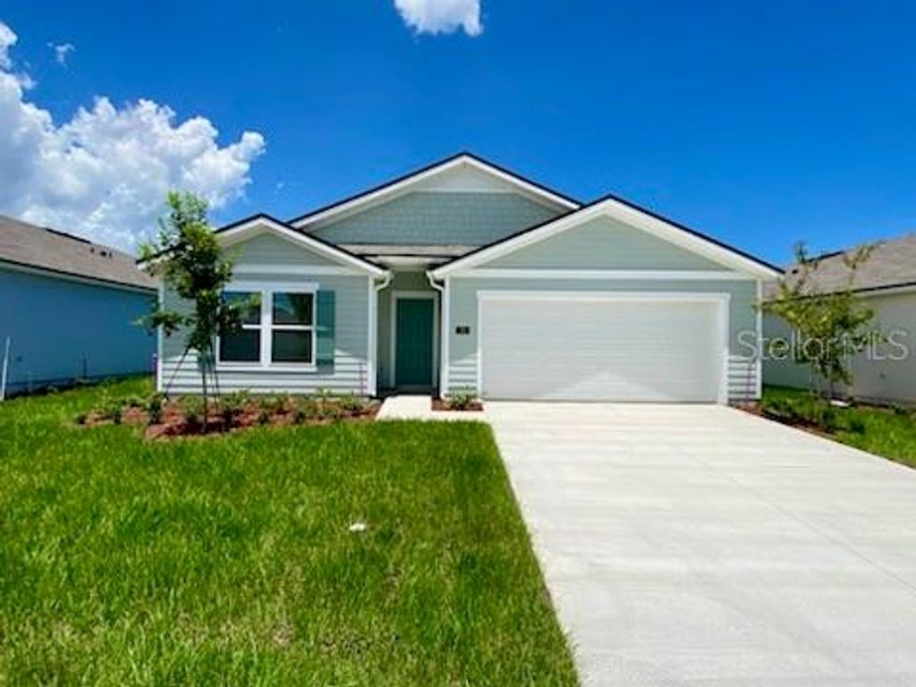 Photo of 71 Hulett Woods Road S, Palm Coast, FL 32137 (MLS # FC301276)