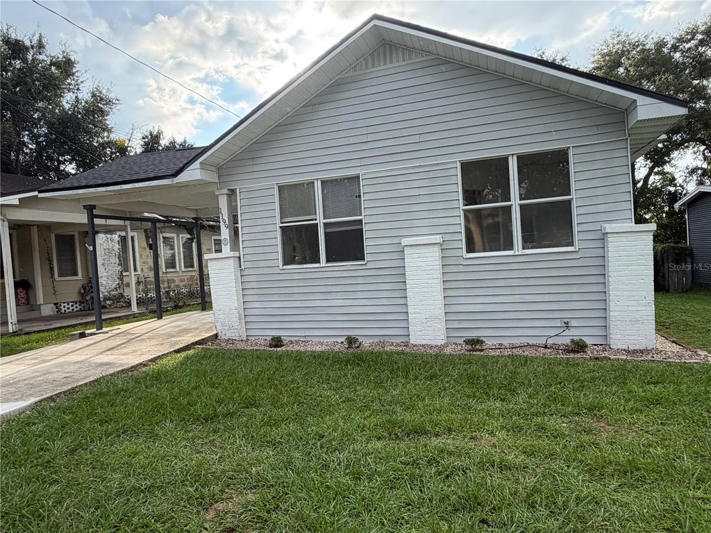 Photo of 1199 King Avenue, Lakeland, FL 33803 (MLS # B4902394)