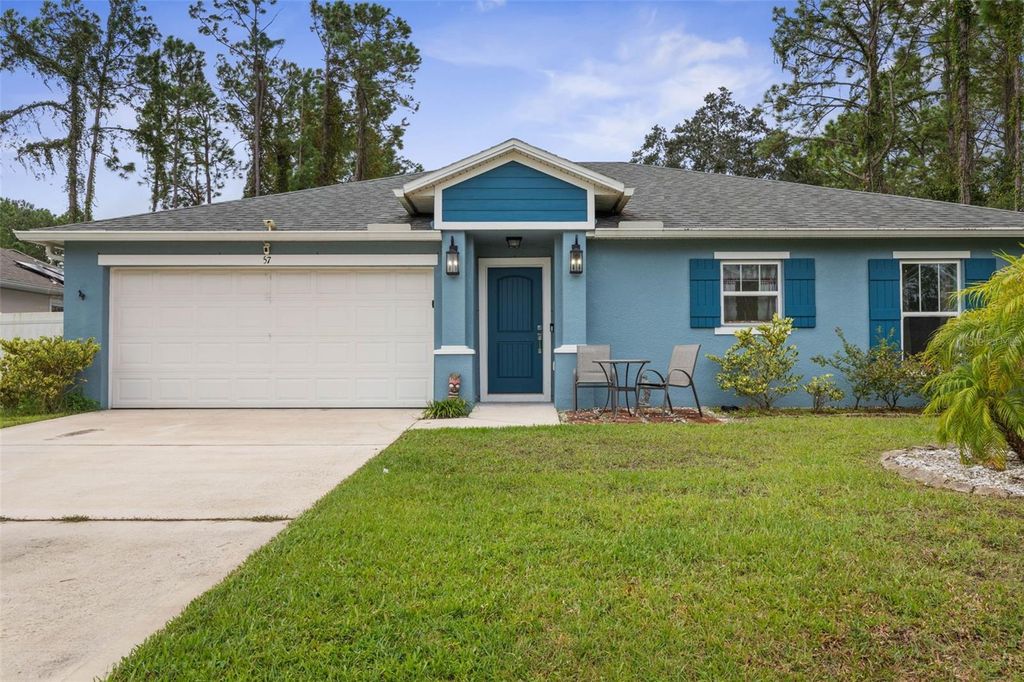Photo of 57 Palmwood Drive, Palm Coast, FL 32164 (MLS # FC313139)