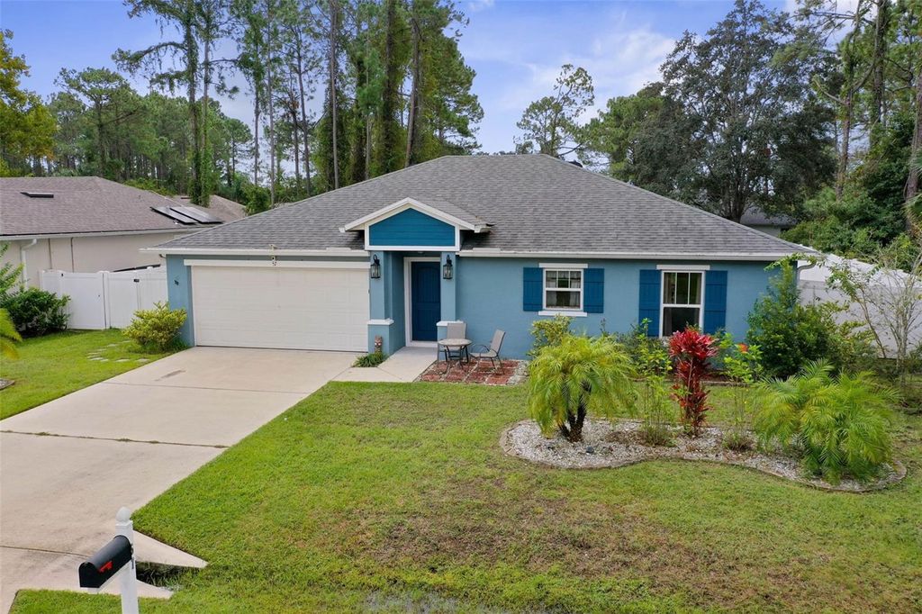 Photo of 57 Palmwood Drive, Palm Coast, FL 32164 (MLS # FC313139)