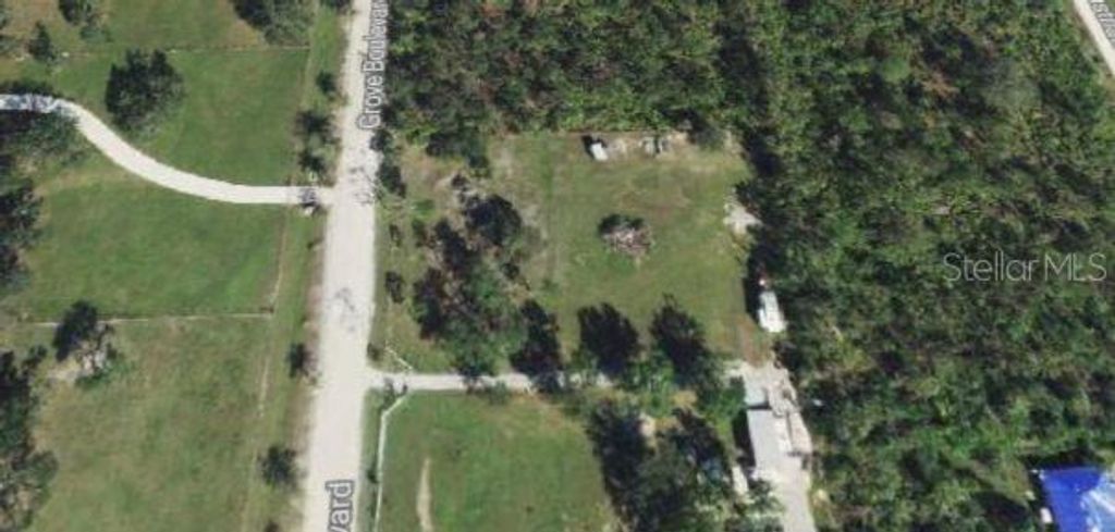 Photo of 6104 Grove Boulevard, Punta Gorda, FL 33982 (MLS # A4688337)