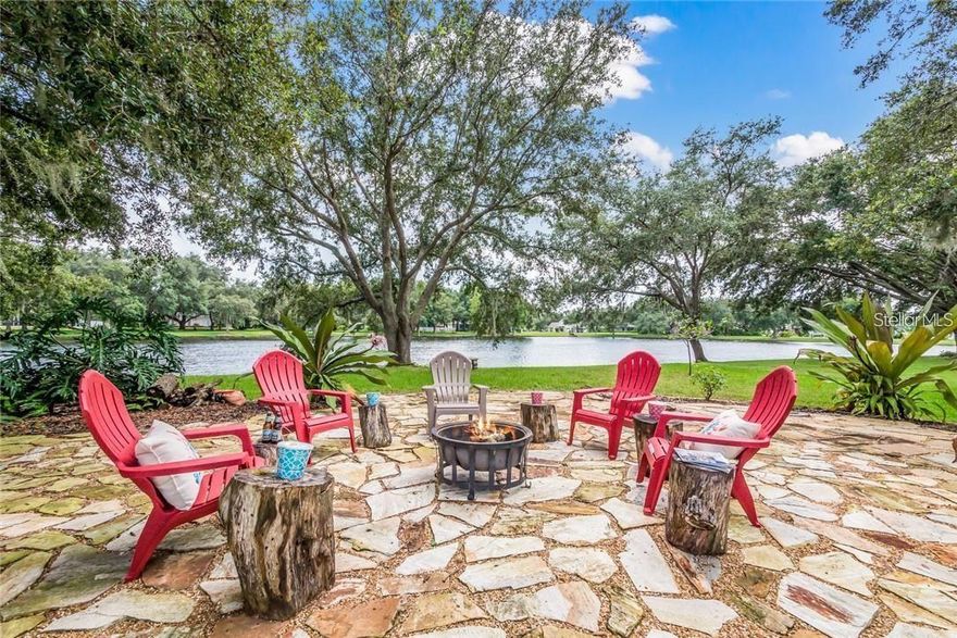 One or more photo(s) has been virtually staged. Must See, Move-In Ready Spectacular Lake & Garden View Florida Oasis! Spacious 4 Bd + Flex Room, 3 Bath, 3 Car Garage, SFH sits on Fully Irrigated .51 Acre Lot, Nestled in Tranquil Park Like Setting of Highly Desirable Country Creek w/ A-Rated Lakewood Ranch Schools. Location, Luxury & Condition Set this Gem Apart! Completely Upgraded to Highest Luxury Standards (2015-2025), Tastefully Updated w/ Attention to Details & Meticulously Maintained w/ Pride of Ownership. Striking Curb Appeal w/ Distinctive Taste Inspired by Lavish Mediterranean Villas, Limestone Accent Walls, Architectural Moldings, French Chateau’ Lightings, Extra Large Driveway & Professionally Designed Landscaping. New Shingle Roof (2021), 6” Gutters/Downspouts w/ Leaf Guard & Buried Pop-Up Drains provide Peace-of-Mind & Ease of Maintenance. Expansive Covered Front Porch, Rear Lanai & Waterfront Backyard host Hummingbirds, Blue Jays, Red Robbins, Hawks, Woodpeckers & Butterflies in Year-Round Blooming Florida-Friendly Low-Maintenance Butterfly & Rock Gardens w/ Tropical Palms, Bird of Paradise, Hibiscus, Desert Rose, Pineapples & Succulents. Brick Paved Walkway leads to Grand Double French Door Entry secured w/ Lockly Elite Video Smart Lock w/ Camera, Wi-Fi, PIN Genie® Keypad, No Monthly Fee Remote Control App & 2 Way Audio Doorbell. Impressive Soaring High 12’ Ceiling Foyer & 14’ Cathedral Ceilings in Formal Living & Dining Rooms where Extraordinary Expansive Lake & Garden View Takes Your Breath Away! New Nucore 8mm High Performance Luxury Vinyl Flooring in Formal Living & Dining, All Secondary Bedrooms & Flex Room (2025) is Water/Pet Proof, Extreme Scratch/Dent Resistant & Easy-To-Clean. Designer High-End Gourmet Kitchen is Chef’s Delight w/ Double-Stacked 65” Upper Cabinets w/ Glass Doors, Soft Close Solid Wood Cabinetry, Top of the Line Kitchen Aid Appliances, Large Island, Extra-Large Breakfast Bar, Italian Hardware, Walk-In Pantry, Inside/Under Cabinet LED Lighting, Hidden Electric Outlets, Glass/Marble Backsplash & Gorgeous Floor to Ceiling Feature Wall. Unobstructed View of FL Great Room, Pool/Spa, Garden & Lake from Kitchen & Breakfast Nook. 4 sets of Sliding Glass Doors spell Ultimate Indoor-Outdoor FL Living Experience. Split Floor Plan offers Privacy & Functionality. Master Bedroom Suite in front of home w/ Coffered Ceiling, 2 Large His & Her Walk-In Closets, View of Tropical Haven & a Luxury Spa Bathroom w/ Dual Sinks, Garden Tub, Separate Vanity & Spacious Walk-In Roman Shower w/ Fresco Rain/Body Shower System, 5.5’ Carrara Marble Bench, Glass & Marble Mosaic Tiles & Frameless Glass Enclosure is Fit for Royalty. Largest Secondary Bedroom serves as 2nd Master in rear of the property w/ Dedicated Bathroom opening up to Pool & Backyard. Huge Flex Room w/ Sliding Glass Door leads to Great Outdoors w/ Full View of Lakeside Backyard Oasis. This wing can serve as a Mother-In-Law Suite. 3rd wing boasts 2 Bedrooms & 3rd Luxury Bathroom w/ Tub & Shower. Brick Paved Pool Deck, Caribbean Blue Pebble Tech Salt-Water Heated Pool w/ Iridescent Glass Tiles, Multi-Color LED Pool Lighting, HotSpring Spa, Night Blooming Jasmine & Expansive 180 Degree Lake/Garden View make an Exceptional Lanai. 109’ Paved Pathway from Pool Cage to Impressive Serene Lakeside Flagstone Area w/ Spanish-Moss-Covered Mature Florida Oak Trees swaying in Subtle Gulf Breeze Reminiscent of Elegant Old Florida. Home Warranty until Dec 30, 2026. Seller is Listing Agent & Licensed Florida Realtor.