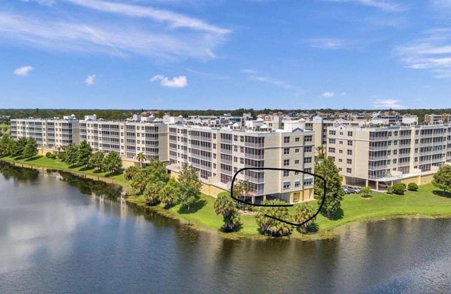 Discover the perfect harmony of luxury, serenity, and exceptional value in this stunning lakefront condominium at 1200 Country Club Drive #1101. Nestled within the prestigious East Bay Golf Course community, this first-floor corner residence offers an expansive 275-degree panorama of lush fairways, sparkling lakes, swaying palms, and tranquil skies.
Step inside to experience refined living with an open-concept design, high ceilings, and abundant natural light that accentuate the home’s spacious feel. The oversized screened lanai and private terrace seamlessly extend the living area outdoors, creating a perfect setting for quiet morning coffee, al fresco dining, or sunset entertaining.
This elegant three-bedroom, two-bath retreat includes a deeded oversized under-building garage (#3) and offers both luxury and practicality. The owner’s suite serves as a private oasis featuring dual walk-in closets, a spa-inspired en-suite bath with two vanities, a large double shower, and a private water closet—plus direct lanai access for serene mornings overlooking the lake.
The split floor plan ensures privacy for guests or flexibility for a home office, while the generous laundry room and ample storage provide everyday convenience.
Enjoy a resort-style lifestyle with exclusive community amenities including a heated pool, relaxing spa, and an upgraded clubhouse, all within a meticulously maintained, professionally managed, solid-concrete building (SIRS compliant) that offers peace of mind and no evacuation requirements.
Perfectly situated near shopping, dining, parks, and the Gulf beaches, Country Club Condominiums is one of Pinellas County’s most sought-after communities, offering strong investment potential and a relaxed, upscale lifestyle.
This property truly delivers million-dollar views and luxury living at a fraction of the cost. With its impeccable design, unmatched setting, and motivated sellers offering $5,000 in buyer concessions, this is an opportunity not to be missed.
Experience the beauty of lakefront and golf course living—a hidden oasis where every sunset feels like a private show. Schedule your private tour today and make Unit 1101 at Country Club Condominiums your next chapter in Florida paradise.