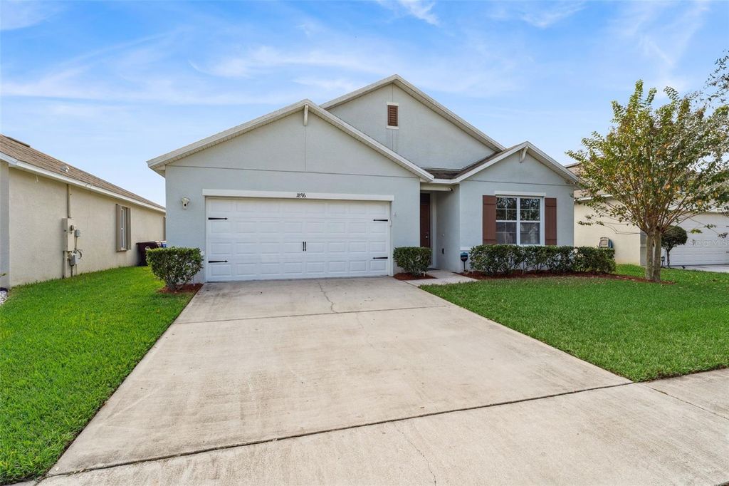 Photo of 1896 Green Dragon Drive, Saint Cloud, FL 34771 (MLS # O6364391)