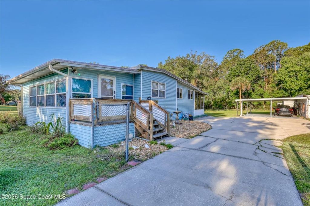 Photo of 2540 Tuscany Drive, Mims, FL 32754 (MLS # O6400644)