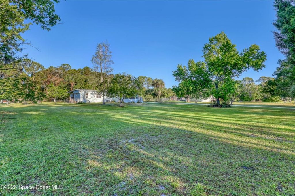 Photo of 2540 Tuscany Drive, Mims, FL 32754 (MLS # O6400644)