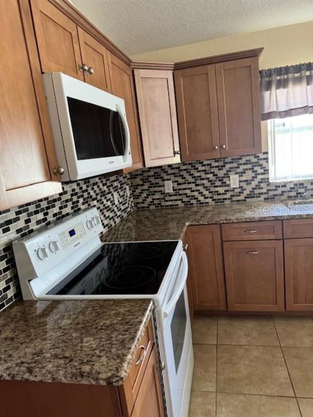 Photo of 5435 Bryce Canyon Drive, Kissimmee, FL 34758 (MLS # S5130160)