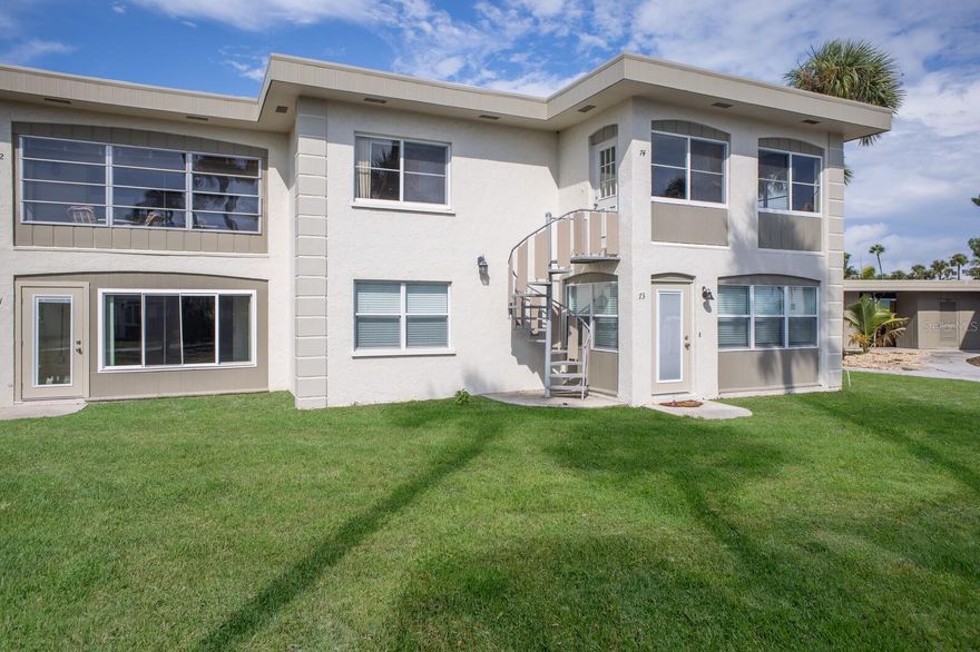 Located in the quaint Shell Point condominium community, this second story end unit offers a rare 3BD/2BA layout filled with potential and ready for your personal touch. Featuring impact windows for peace of mind, this spacious condo invites natural light from multiple exposures, creating a bright and airy feel throughout. A well-designed floor plan provides comfortable living spaces, while the added convenience of a dedicated carport and private storage ensures practicality alongside charm. The community’s amenities include a clubhouse, heated pool, tennis court, shuffleboard and waterside patio with kayak/paddleboard launch area offering opportunities for outdoor enjoyment galore. Pets are allowed along with monthly rentals too. Don’t let this cute little slice of island life slip away and make it yours today!